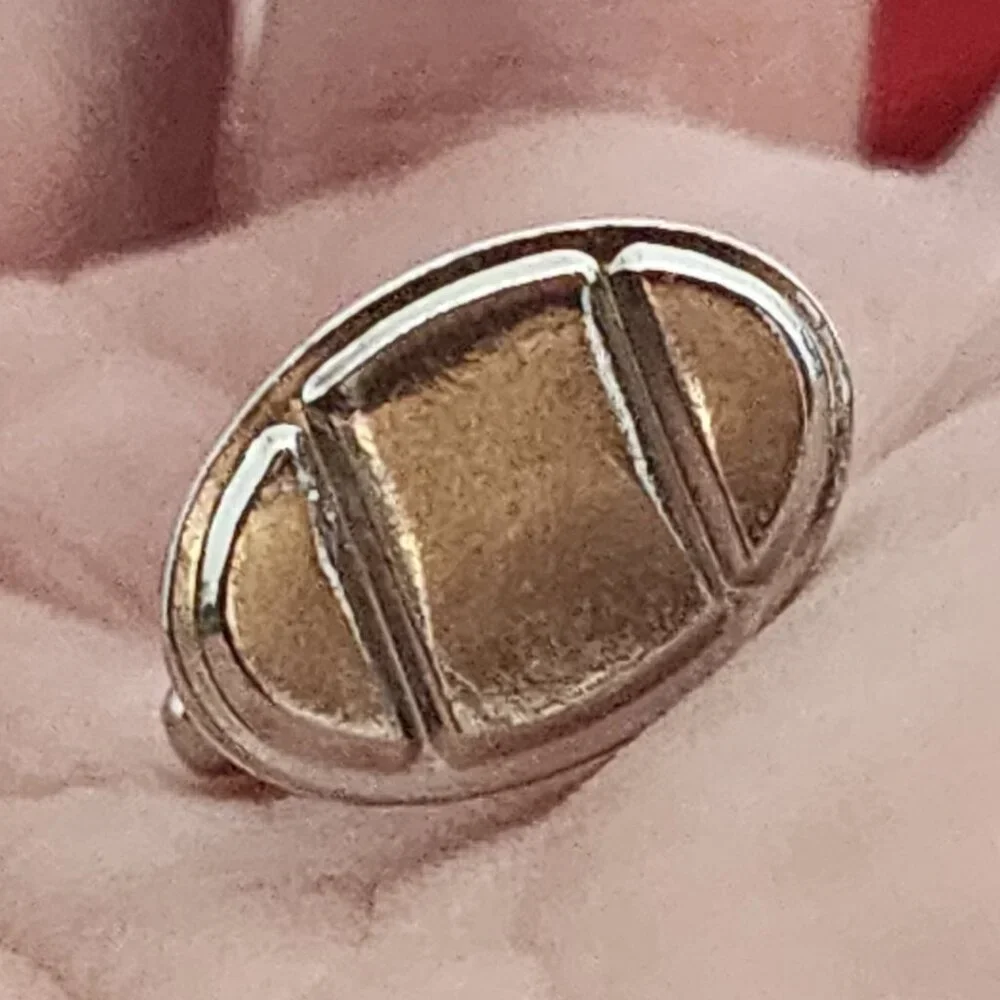 Source Unknown minimalist silver